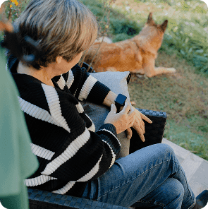 User wearing the Hyfe CoughMonitor during routine home activities