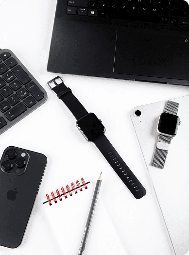 Hyfe CoughMonitor device with interchangeable straps and accessories displayed on a desk